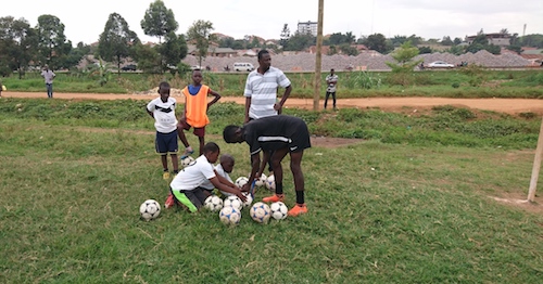 Kampala Galaxy Soccer Academy coaches and players